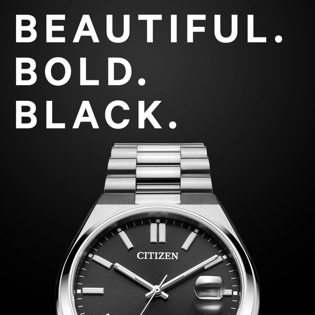 Citizen-kello, jossa sanat 'Beautiful. Bold. Black.' mustalla taustalla.