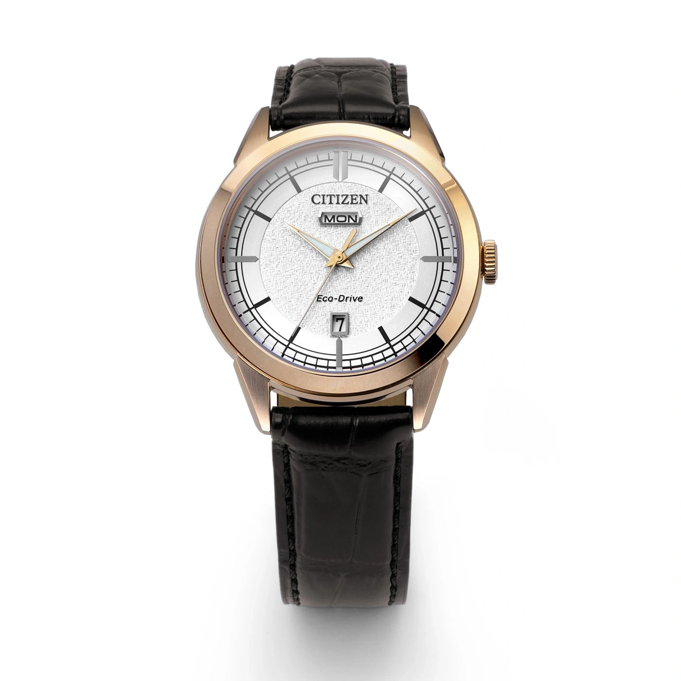 Citizen Eco-Drive -kello, jossa valkoinen teksturoitu kellotaulu ja musta nahkaranneke.