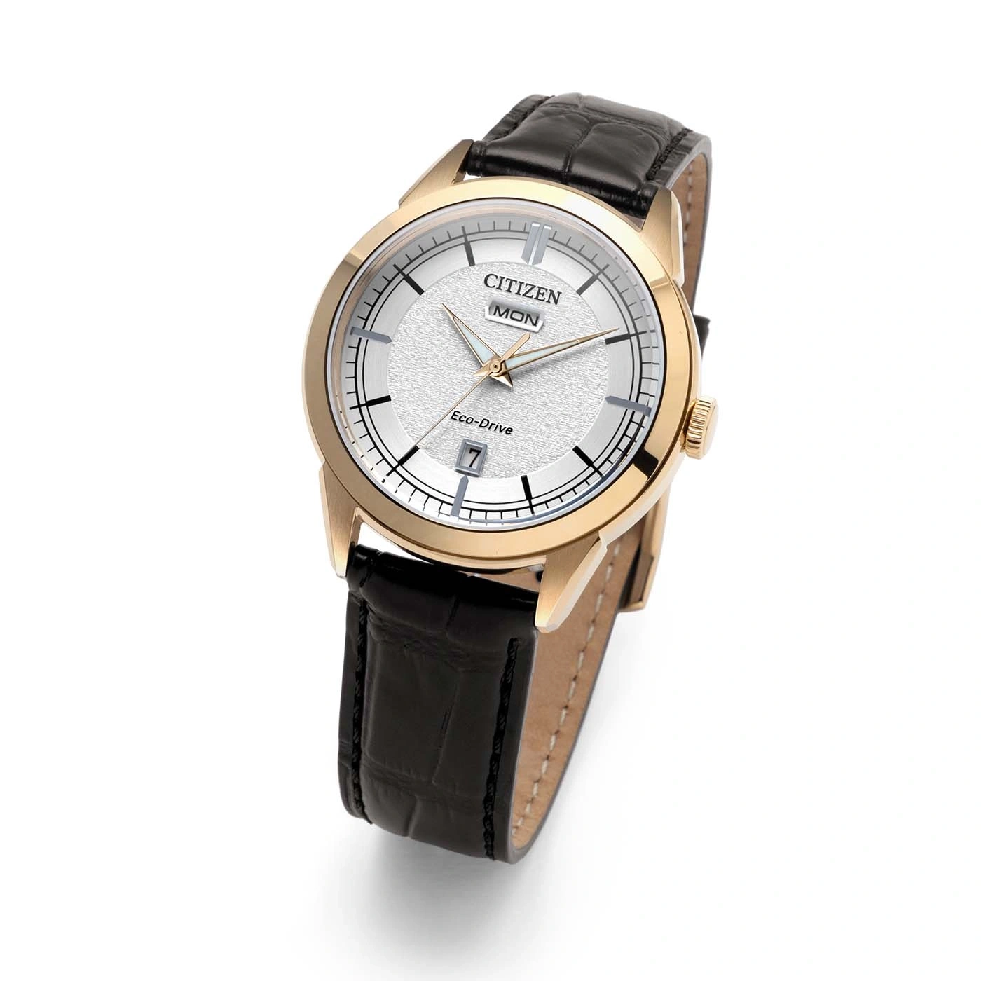 Citizen Eco-Drive -kello, jossa valkoinen teksturoitu kellotaulu ja musta nahkahihna.